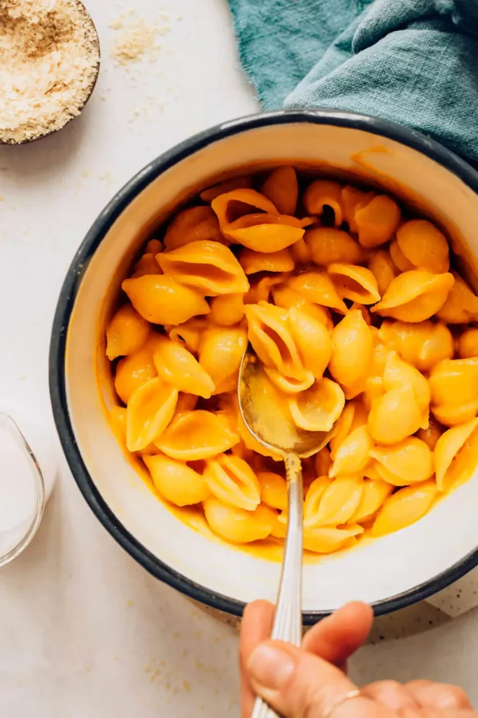 A bowl of vegan mac and cheese made with cashews and nutritional yeast